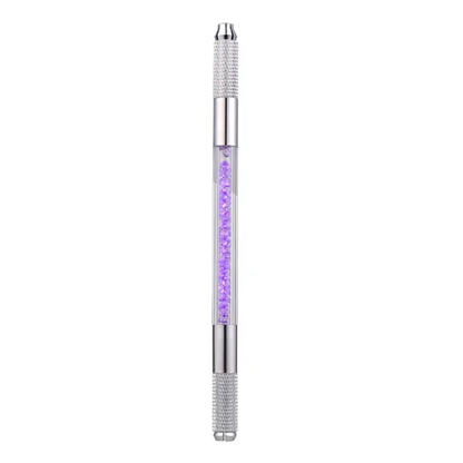 a white pen with purple writing on it