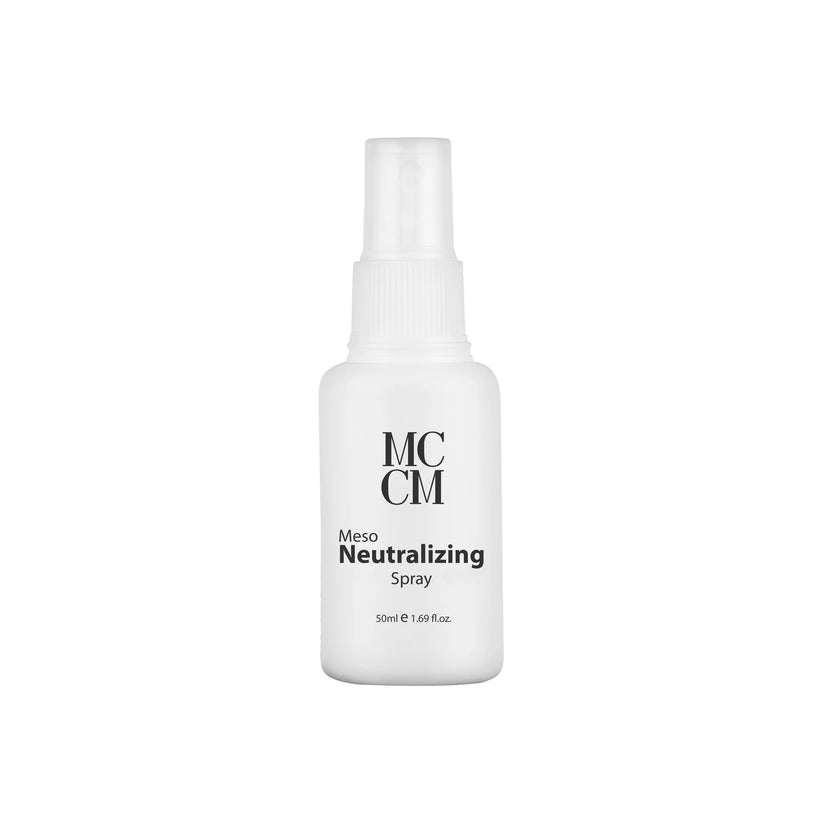 a bottle of mccm neutralizing spray on a white background