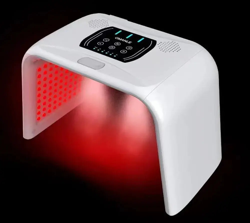 an electronic device with a red light on top of it