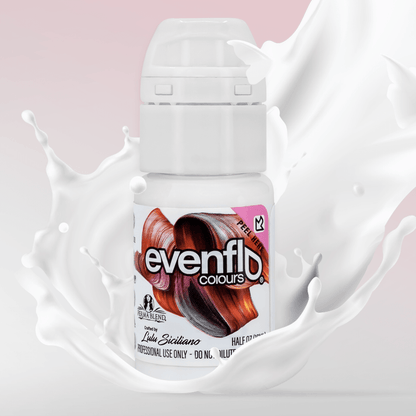 a bottle of evenflo liquid with a splash of milk