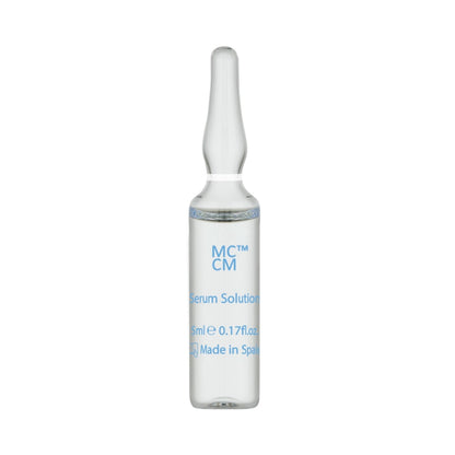 a bottle of micro crm solution on a white background