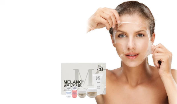 a woman holding up a box of melanoc gels