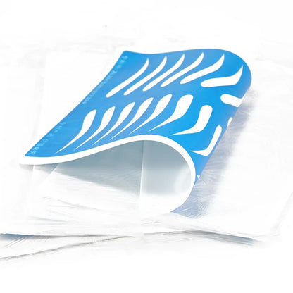 a stack of white napkins sitting on top of each other