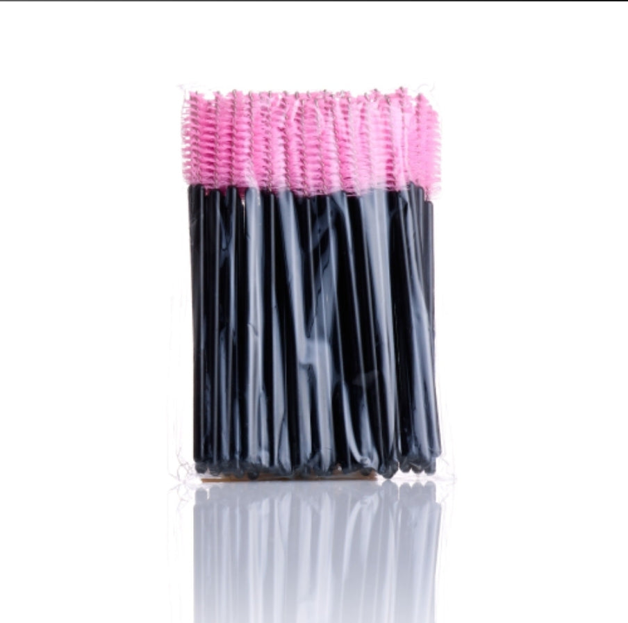 a bunch of pink and black toothbrushes in a bag