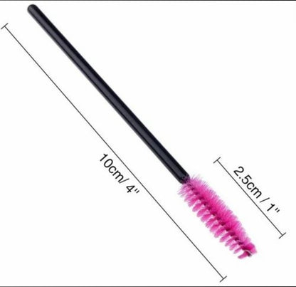 a close up of a pink mascara on a white background