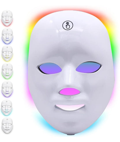 a white mask with different colored eyes