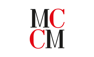 a black and red logo with the words mcm