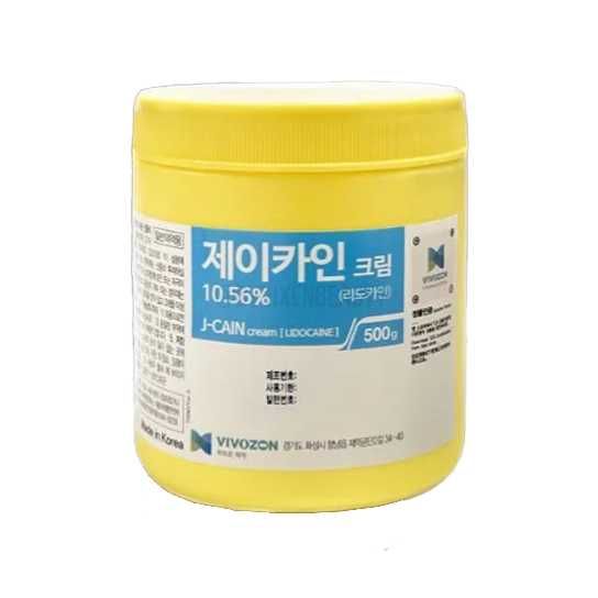 a jar of yellow paint on a white background